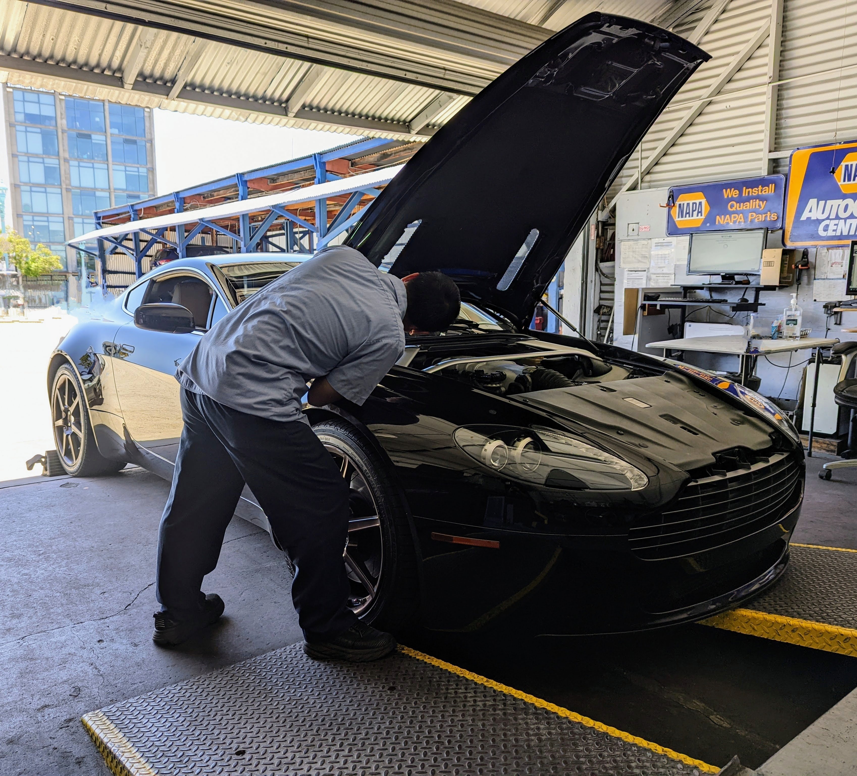 Aston Martin on Lift at NAPA AutoCare Center